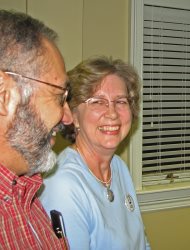 President Gloria and the First Dude share a laugh.