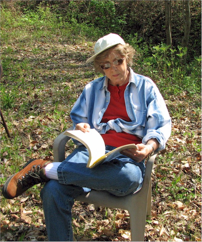 Gloria reading up on gold mines in Alabama.