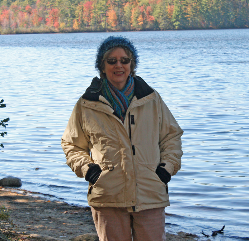 By a lake, leaf peeping.