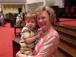 With grandson A at EJ's baptism.