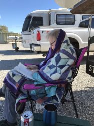 Gloria never missed an opportunity to read, even when she was cold.