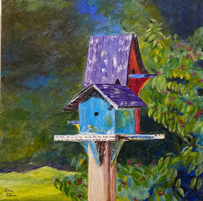 Gloria loved to paint bird houses.  This one is displayed over my piano.